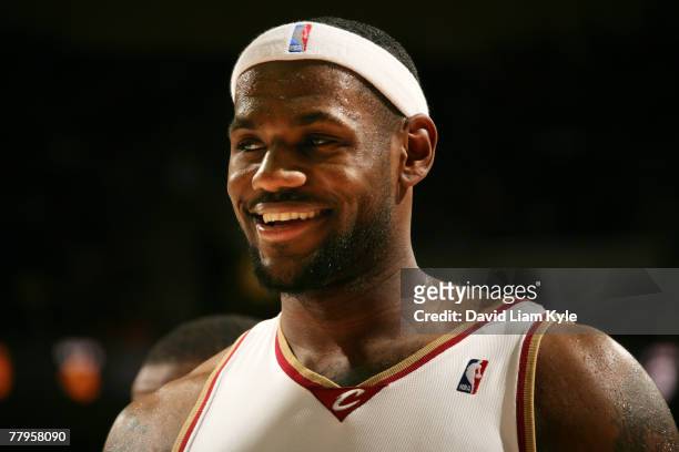 LeBron James of the Cleveland Cavaliers smiles during a break in the action against the Utah Jazz at The Quicken Loans Arena November 16, 2007 in...