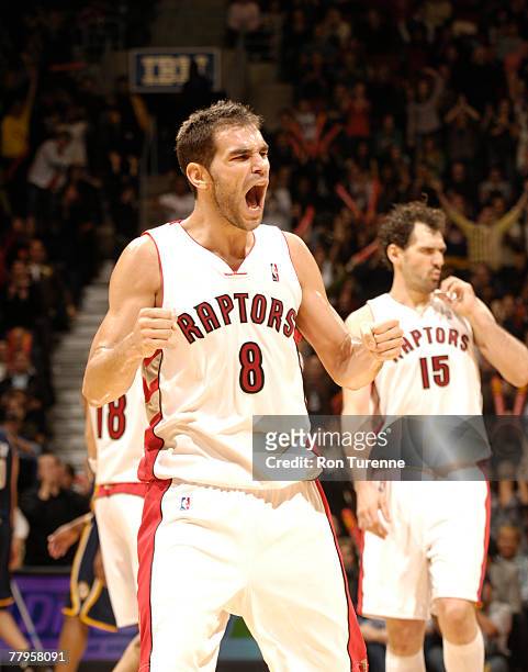 Jose Calderon of the Toronto Raptors celebrates his 3-pointer late in the fourth quarter during the game against the Indiana Pacers on November 16,...