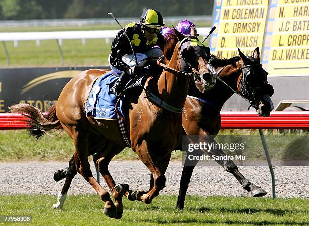 Jockey Noel Harris rides Everswindell past Michael Coleman on BringBackTheBiff to win the Christchurch Casino New Zealand Cup at Riccarton Park...