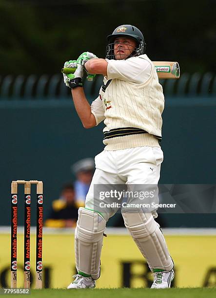 Adam Gilchrist of Australia hits a ball for six runs during day two of the Second test match between Australia and Sri Lanka at Bellrevie Oval...