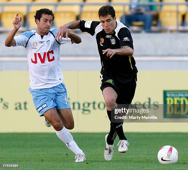 Daniel of the Phoenix contests with Alex Brosque of Sydney for the ball during the round 13 A-League match between the Wellington Phoenix and Sydney...