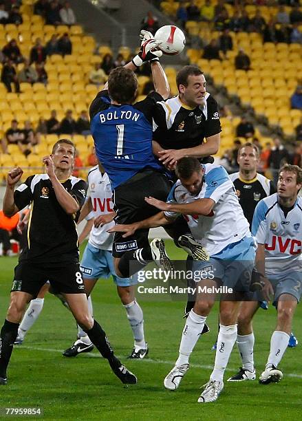 Ross Aloisi captain of the Phoenix is blocked by Clint Bolton keeper for Sydney during the round 13 A-League match between the Wellington Phoenix and...