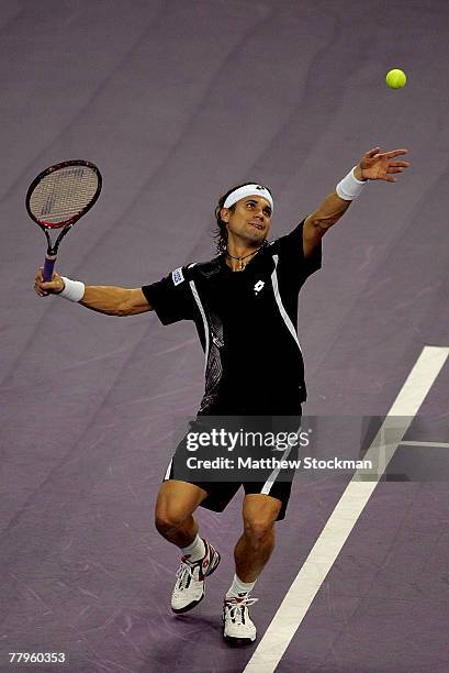 David Ferrer of Spain serves to Andy Roddick of the United States in the semifinals November 17, 2007 during the Tennis Masters Cup at Qi Zhong...