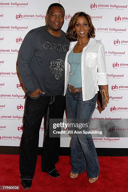 Football player Rodney Peete and actress Holly Robinson Peete arrive at Jon Stewart's performance at Planet Hollywood Resort & Casino's Grand Opening...