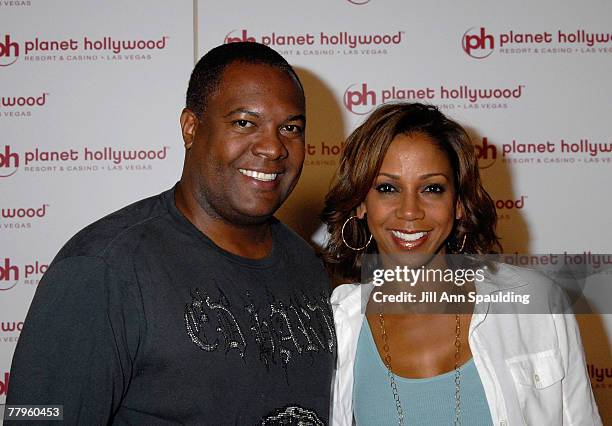 Football player Rodney Peete and actress Holly Robinson Peete arrive at Jon Stewart's performance at Planet Hollywood Resort & Casino's Grand Opening...