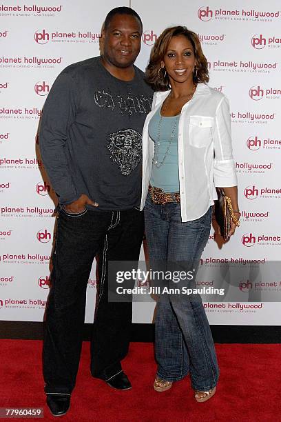 Football player Rodney Peete and actress Holly Robinson Peete arrive at Jon Stewart's performance at Planet Hollywood Resort & Casino's Grand Opening...