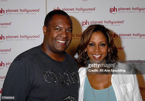 Football player Rodney Peete and actress Holly Robinson Peete arrive at Jon Stewart's performance at Planet Hollywood Resort & Casino's Grand Opening...