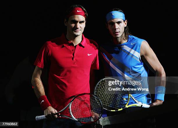 Roger Federer of Switzerland and Rafael Nadal of Spain pose before their semi-final match of the Tennis Masters Cup at Qi Zhong Stadium on November...