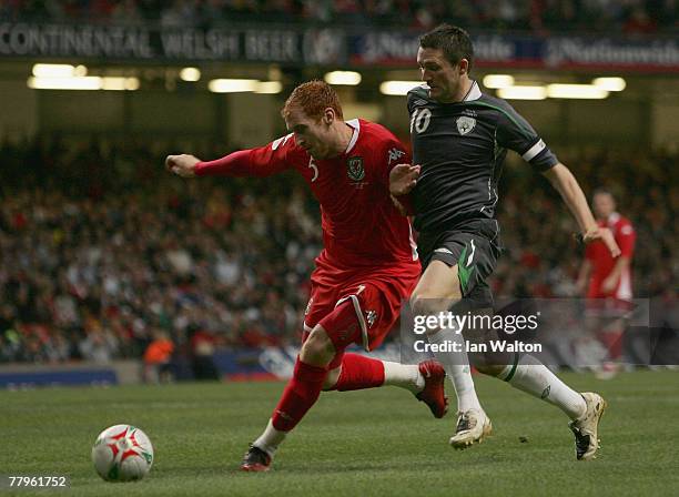 James Collins of Wales tries to tackle Robbie Keane of Republic of Ireland during the Euro2008 Qualifier match between Wales and Republic of Ireland...