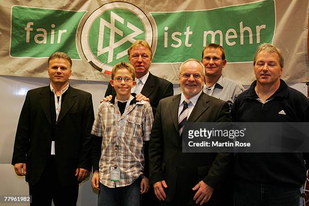 Junior coach of the DFB Horst Hrubesch poses for a picture with members of the Schleswig Holstein football association at the Fair Play trophy 2007...