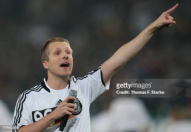 Presenter Oliver Pocher sings ahead of the UEFA Euro2008 Group D qualifying match between Germany and Cyprus at the WM Stadium on November 17, 2007...