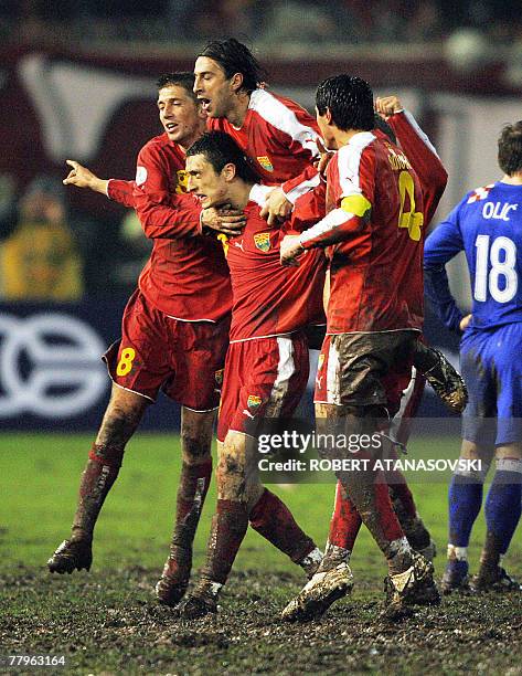 Macedonia's Goran Maznov celebrates with teammates after scoring the goal against Croatia during their group E Euro 2008 qualifying football match 17...