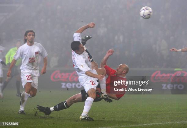 Erik Hagen of Norway scores the opening goal with an overhead kick during the Euro2008 Group C Qualifier match between Norway and Turkey at the...
