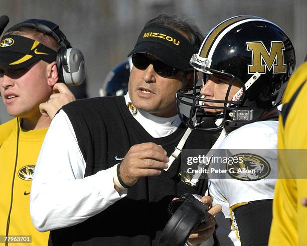 Head coach Gary Pinkel of the Missouri Tigers talks with quarterback Chase Daniel in the second half against the Kansas State Wildcats at Bill Snyder...