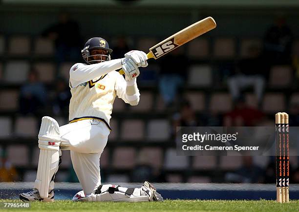 Chamara Silva of Sri Lanka plays a shot during day three of the Second test match between Australia and Sri Lanka at Bellrevie Oval on November 18,...
