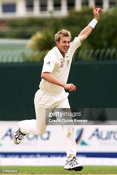 Brett Lee of Australia celebrates taking a wicket during day three of the Second test match between Australia and Sri Lanka at Bellrevie Oval on...