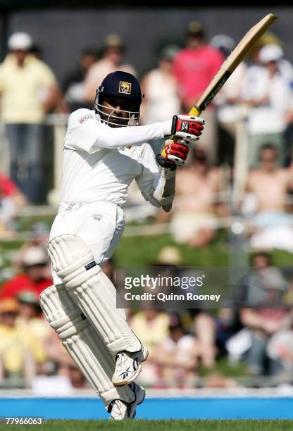 Mahela Jayawardena of Sri Lanka hits a pull shot during day three of the Second test match between Australia and Sri Lanka at Bellrevie Oval on...