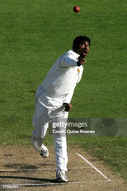 Muttiah Muralitharan of Sri Lanka bowls during day three of the Second test match between Australia and Sri Lanka at Bellrevie Oval on November 18,...