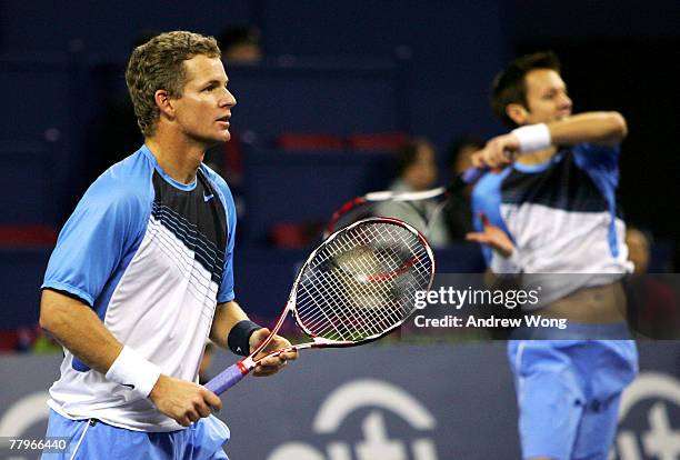 Mark Knowles of Bahamas and Daniel Nestor of Canada return a shot during their doubles final match against Simon Aspelin of Sweden and Julian Knowle...