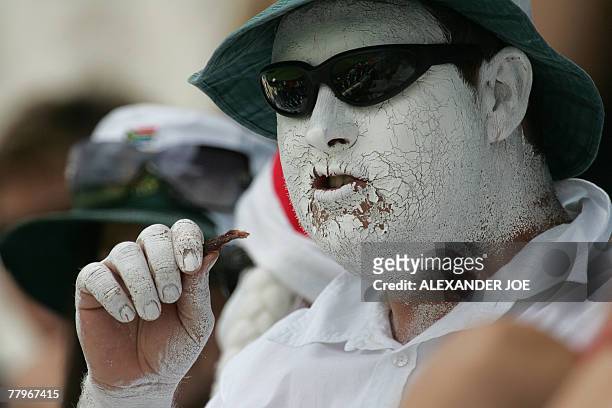 Cricket fan is pictured at Super Sports Park in Centurion, 18 November 2007 during the 3rd day of the 2nd Cricket Test between South Africa and New...