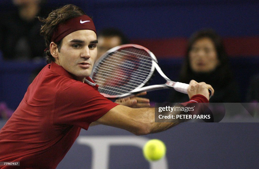 Roger Federer of Switzerland hits a retu