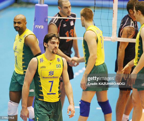 Brazilian volleyball team captain Gilberto Godoy Filho leaves a court after a lose match gainst the United States in the men's World Cup volleyball...