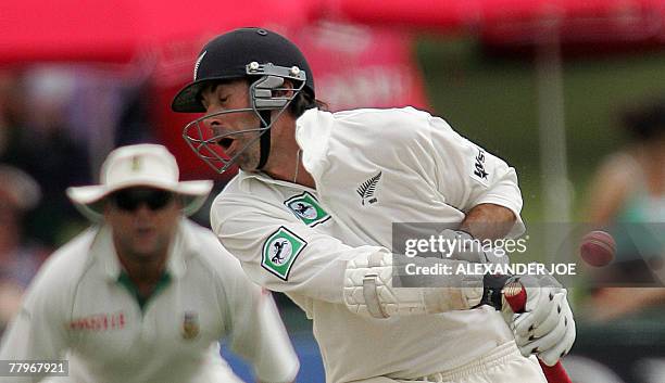 New Zealand's batsman Stephen Fleming avoids a bouncer off the delivery from South African bowler Andre Nel at Super Sports Park in Centurion on the...