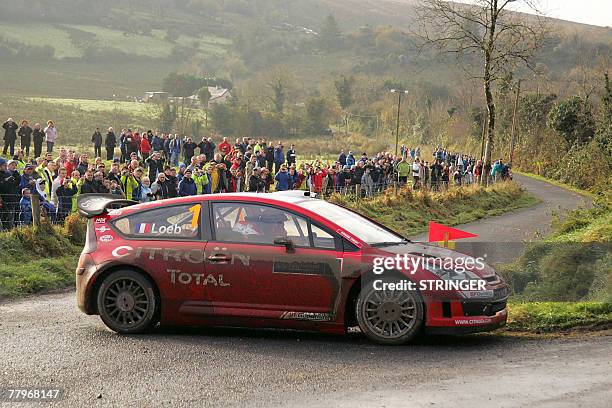 France's Sebastien Loeb steers his car during the Rally of Ireland, 18 November 2007. Loeb tightened his grip on the Rally of Ireland, the...