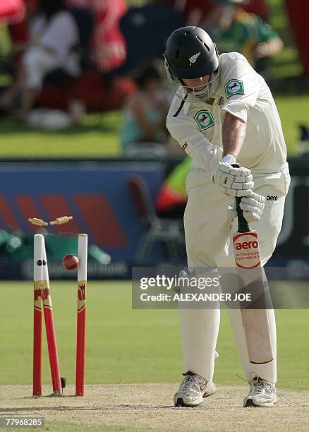 New Zealand's batsman Chris Martin is clean bowled by South African bowler Dale Steyn who took six New Zealand wickets,18 November 2007 at Super...