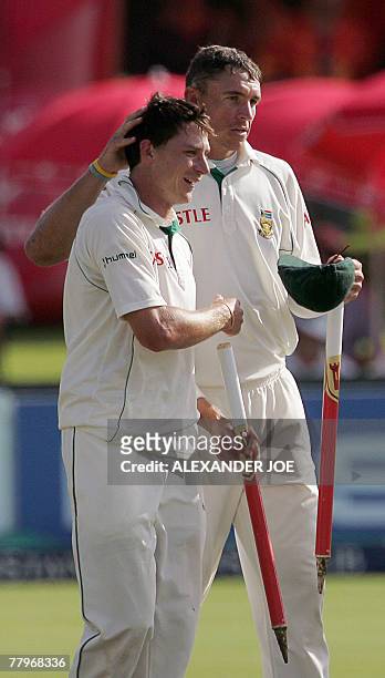 South African bowler Dale Steyn and team-mate Andre Nel celebrate wining the 2nd Cricket Test by an Innings and 59 runs over New Zealand, 18 November...