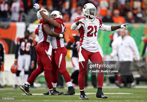 Antrel Rolle of the Arizona Cardinals and teammates celebrate a defensive stop during the NFL game against the Cincinnati Bengals on November 18,...