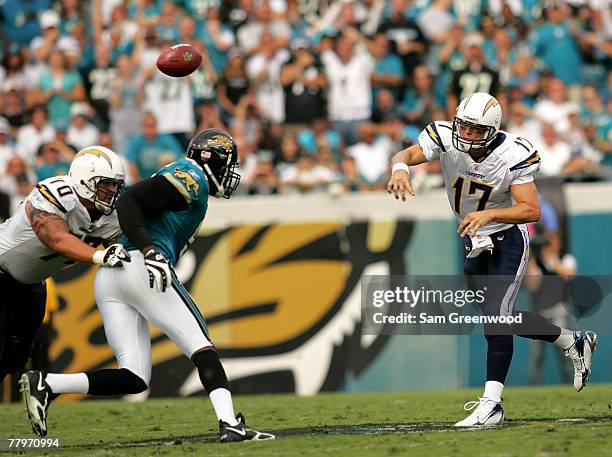 Philip Rivers of the San Diego Chargers throws a pass against the Jacksonville Jaguars at Jacksonville Municipal Stadium on November 18, 2007 in...