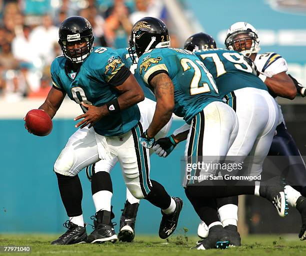 David Garrard of the Jacksonville Jaguars hands off to Fred Taylor at Jacksonville Municipal Stadium on November 18, 2007 in Jacksonville, Florida.