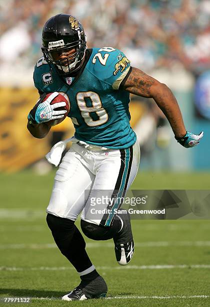 Fred Taylor of the Jacksonville Jaguars runs in a game against the San Diego Chargers at Jacksonville Municipal Stadium on November 18, 2007 in...