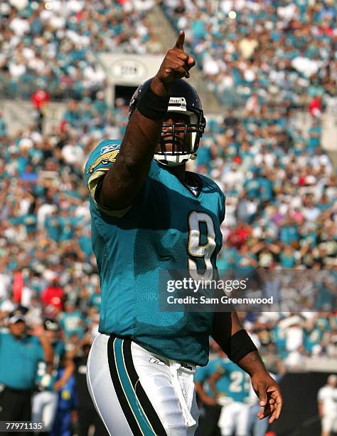 David Garrard of the Jacksonville Jaguars points toward the crowd in a game against the San Diego Chargers at Jacksonville Municipal Stadium on...