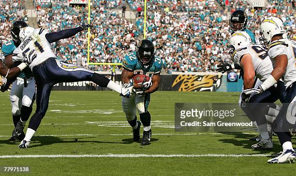Maurice Jones-Drew of the Jacksonville Jaguars scores a touchdown in a game against the San Diego Chargers at Jacksonville Municipal Stadium on...