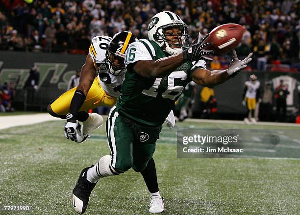 Brad Smith of the New York Jets can't hold on to the ball in the endzone late in the fourth quarter as Deshea Townsend of the Pittsburgh Steelers...