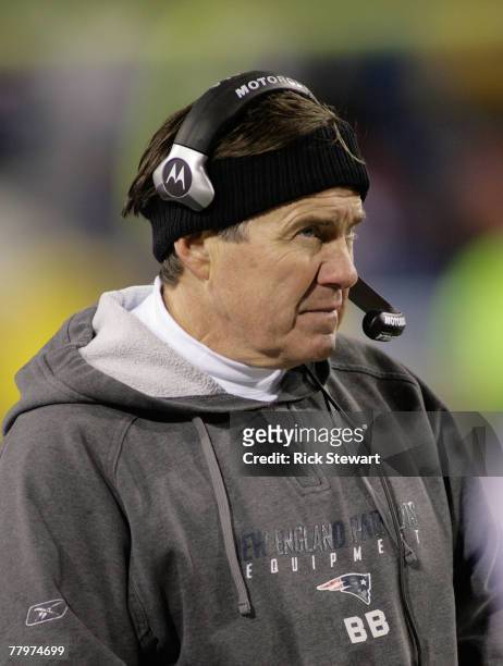 Bill Belichick, head coach of the New England Patriots watches play against the Buffalo Bills at Ralph Wilson Stadium November 18, 2007 in Orchard...