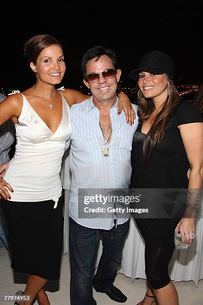 Alicia Piazza, J.R. Ridinger, Loren Ridinger pose at the Audemars Piguet cocktail reception at Mike Piazza's home on November 18, 2007 in Miami...