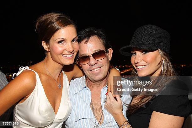 Alicia Piazza, J.R. Ridinger, Loren Ridinger pose at the Audemars Piguet cocktail reception at Mike Piazza's home on November 18, 2007 in Miami...