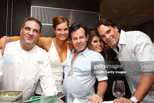 Chef Andrew Swersky, Alicia Piazza, J.R. Ridinger, Loren Ridinger, Mike Piazza pose at the Audemars Piguet cocktail reception at Mike Piazza's home...