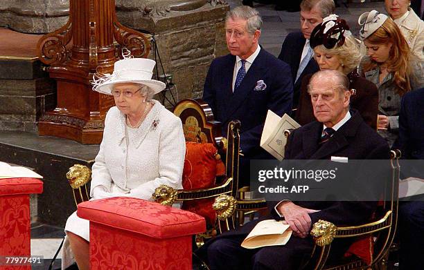 Britain's Queen Elizabeth II and Prince Philip are joined by family members in Westminster Abbey in London, 19 November 2007, during a Service of...