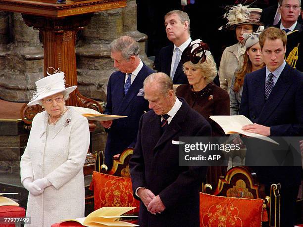 Britain's Queen Elizabeth II and Prince Philip are joined by family members in Westminster Abbey in London, 19 November 2007, during a Service of...