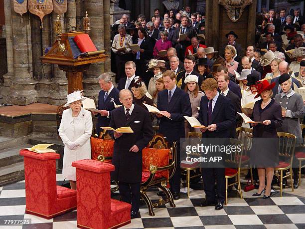 Britain's Queen Elizabeth II and Prince Philip attend a service with family members in Westminster Abbey, in central London, 19 November 2007, to...