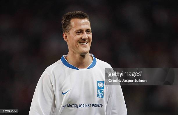 Michael Schumacher of Germany smiles during the fifth Match against Poverty at the La Rosaleda stadium on November 19, 2007 in Malaga, Spain. As...