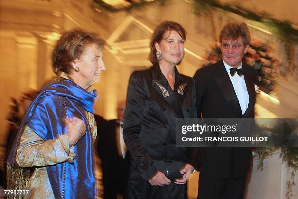 Caroline of Hanover and her husband Ernst-August of Hanover arrive with Chateau de Versaille curator Beatrix Saule to attend the inauguration of the...