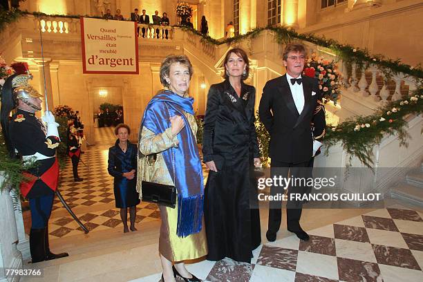 Caroline of Hanover and her husband Ernst-August of Hanover arrive with Chateau de Versailles curator Beatrix Saule to attend the inauguration of the...