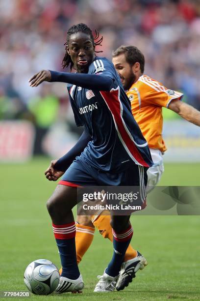 Shalrie Joseph of the New England Revolution handles the ball against the Houston Dynamo during the 2007 Major League Soccer Cup at RFK Stadium on...