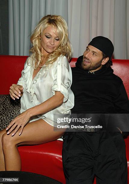 Acctress Pamela Anderson and Rick Salomon at Planet Hollywood Resort & Casino's Grand Opening Weekend on November 16, 2007 in Las Vegas, Nevada.