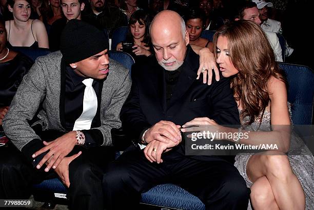 Singer Chris Brown, Manager Rene Angelil, and Singer Celine Dion in the audience during the 2007 American Music Awards held at the Nokia Theatre L.A....